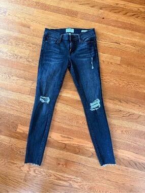 Frame Denim Women's Skinny Jeans in Dark Blue with Distressed Knees